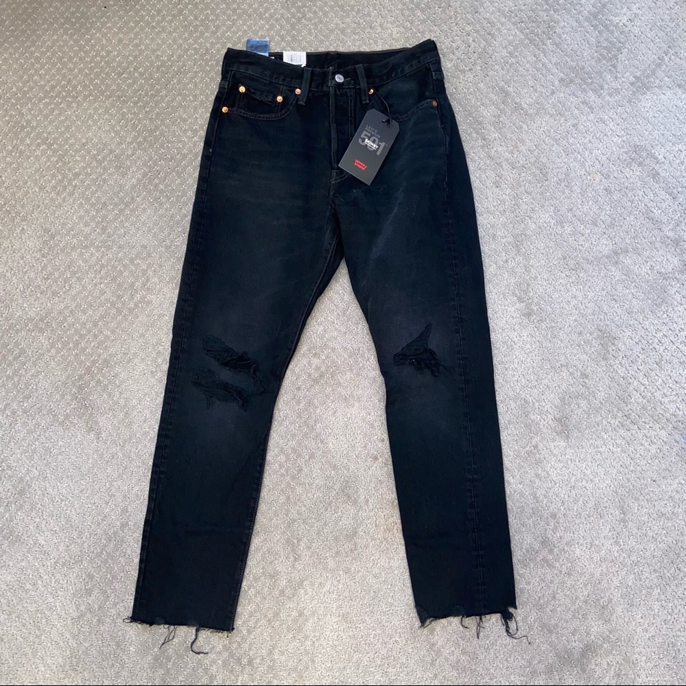 Levi’s 501 high rise straight leg skinny black ripped jeans